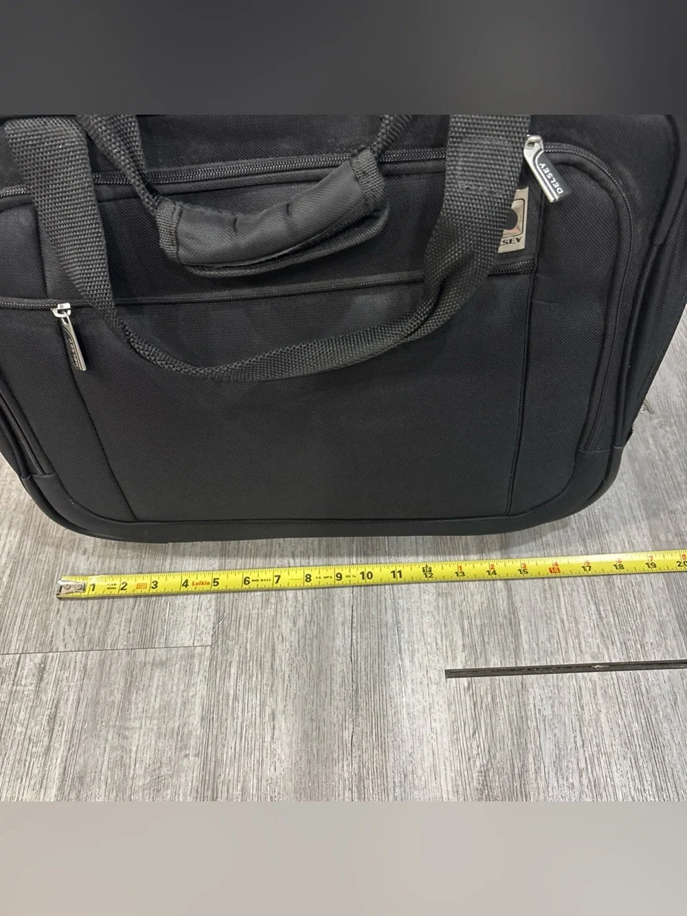 Delsey Paris black travel carryon with wheels luggage suitcase travel